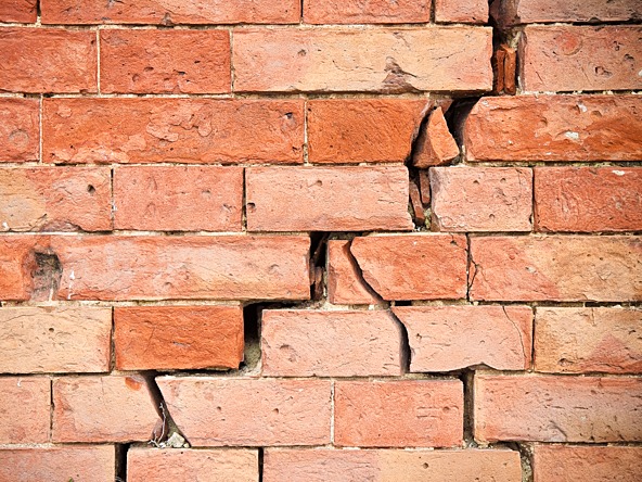 Cracked brick wall
